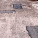 Ірпінське ноу-хау: асфальтове латання ґрунтової дороги  (+фото)